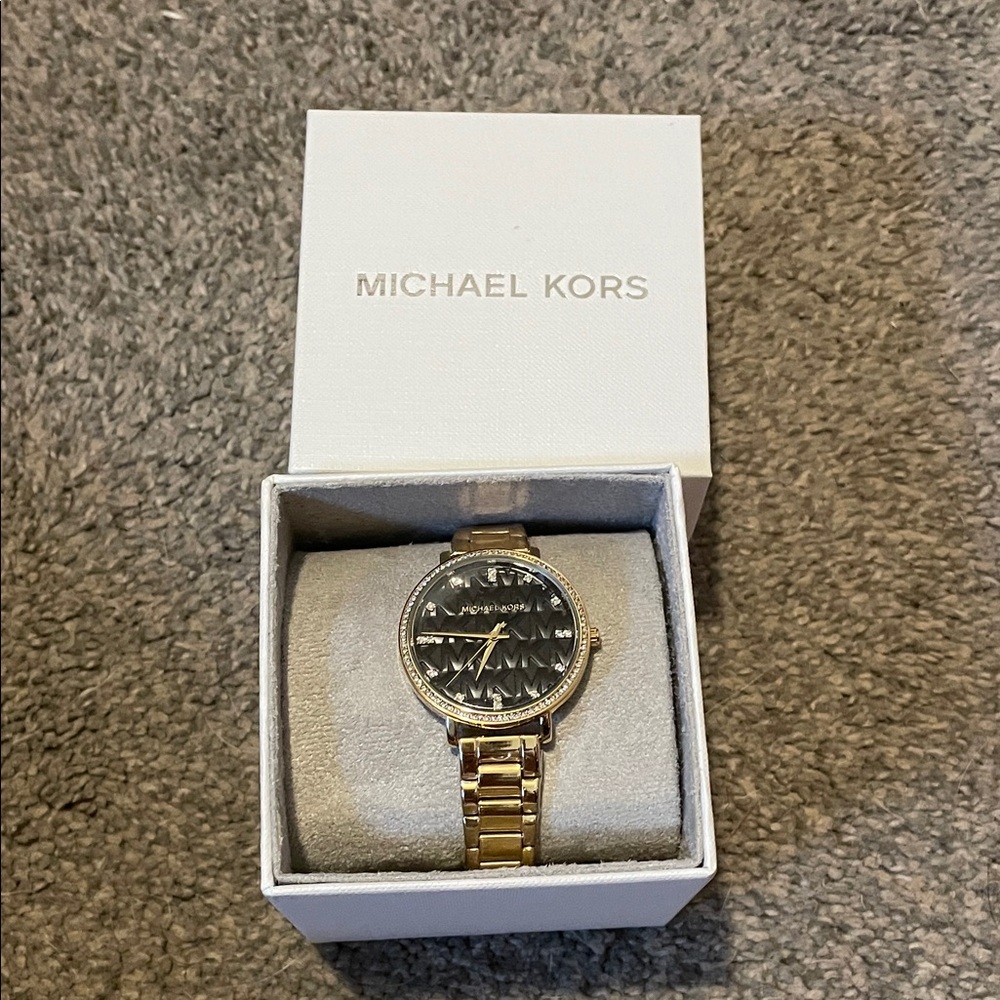 Michael Kors Women’s Watch with Gold Band and Black Dial